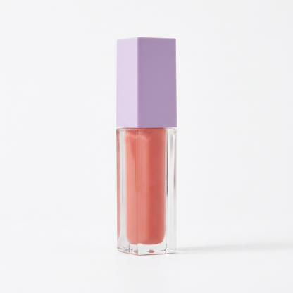 White-background packshot of the logo-free peach-rose lip gloss